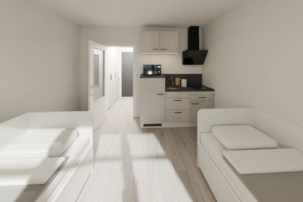 Twin studio Type 01 – view from the window to the kitchenette and the entrance hall, with a daybed on each side